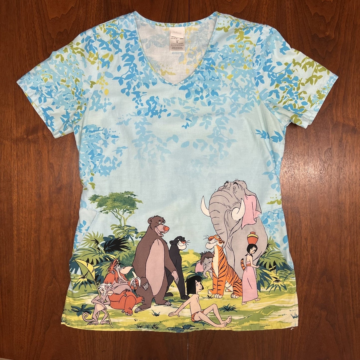 Lot of 4 Disney Scrub Tops Jungle Book, 101 Dalmations, Cinderella, Peter Pan