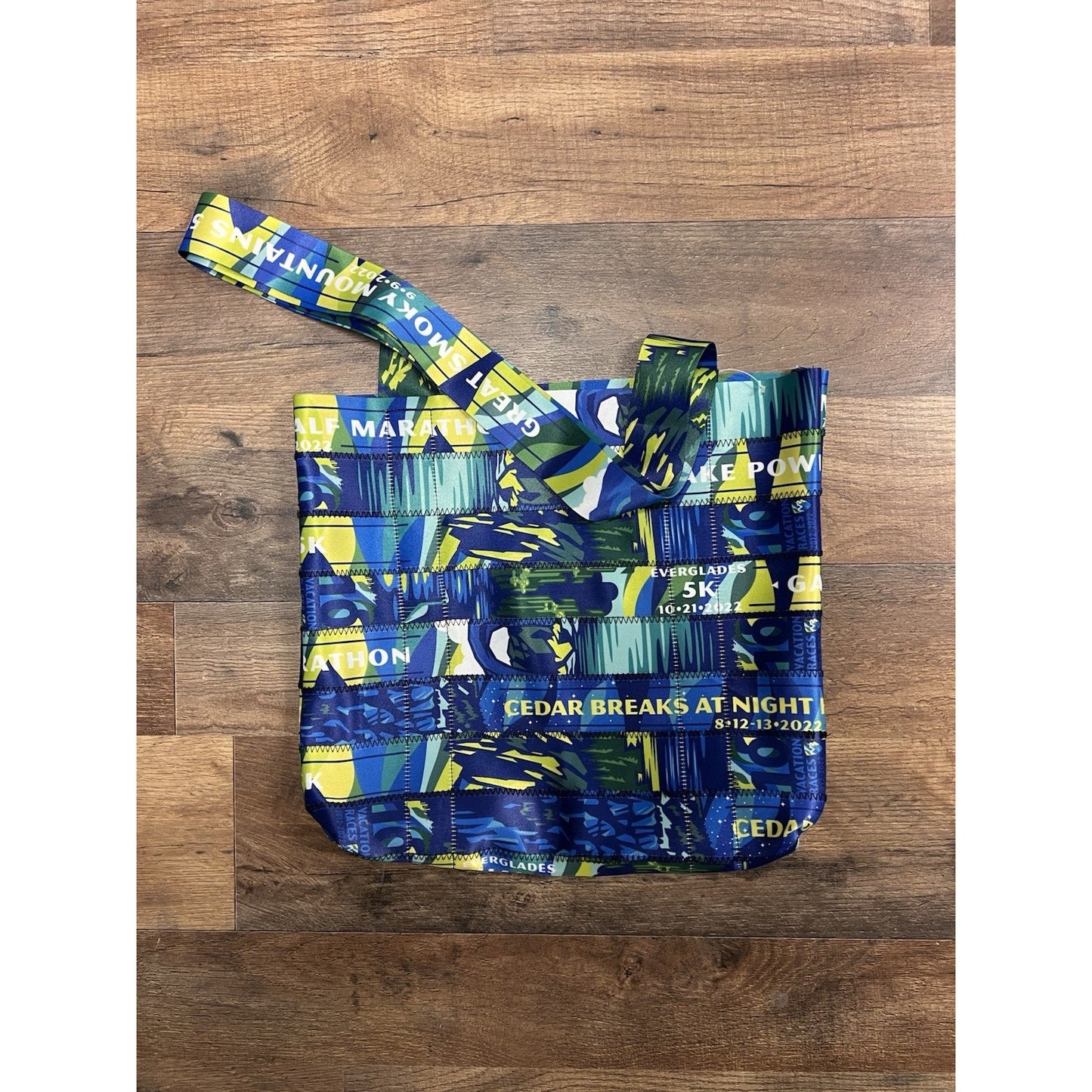 Patchwork Marathon Tote Bag Made of Recycled PVC Featuring Past Marathons