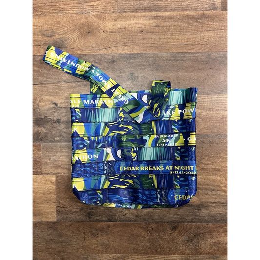 Patchwork Marathon Tote Bag Made of Recycled PVC Featuring Past Marathons