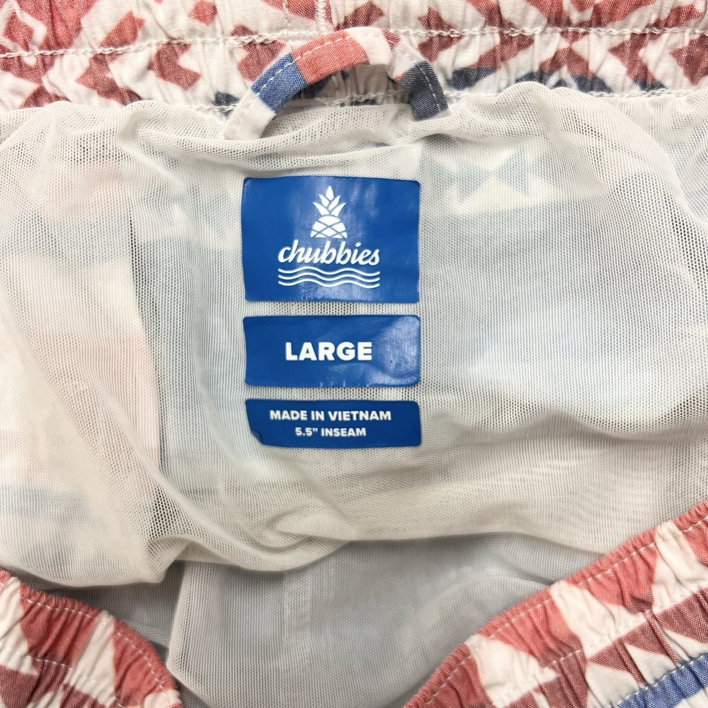 Chubbies (L) 5.5" Inseam Brief Lined Swim Trunks “City Slicker” Aztec Pineapple
