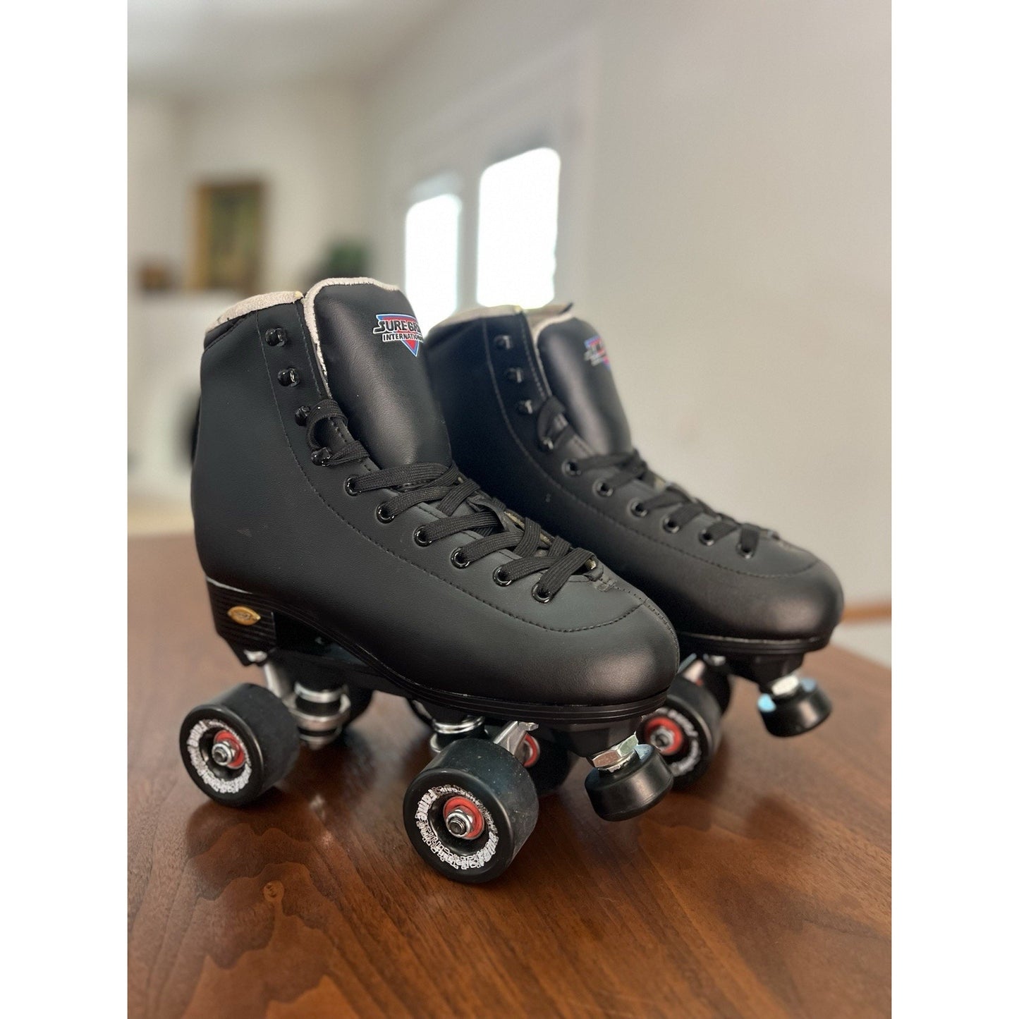 Sure-Grip International Fame Black Quad Roller Skates - Great Condition Size 7