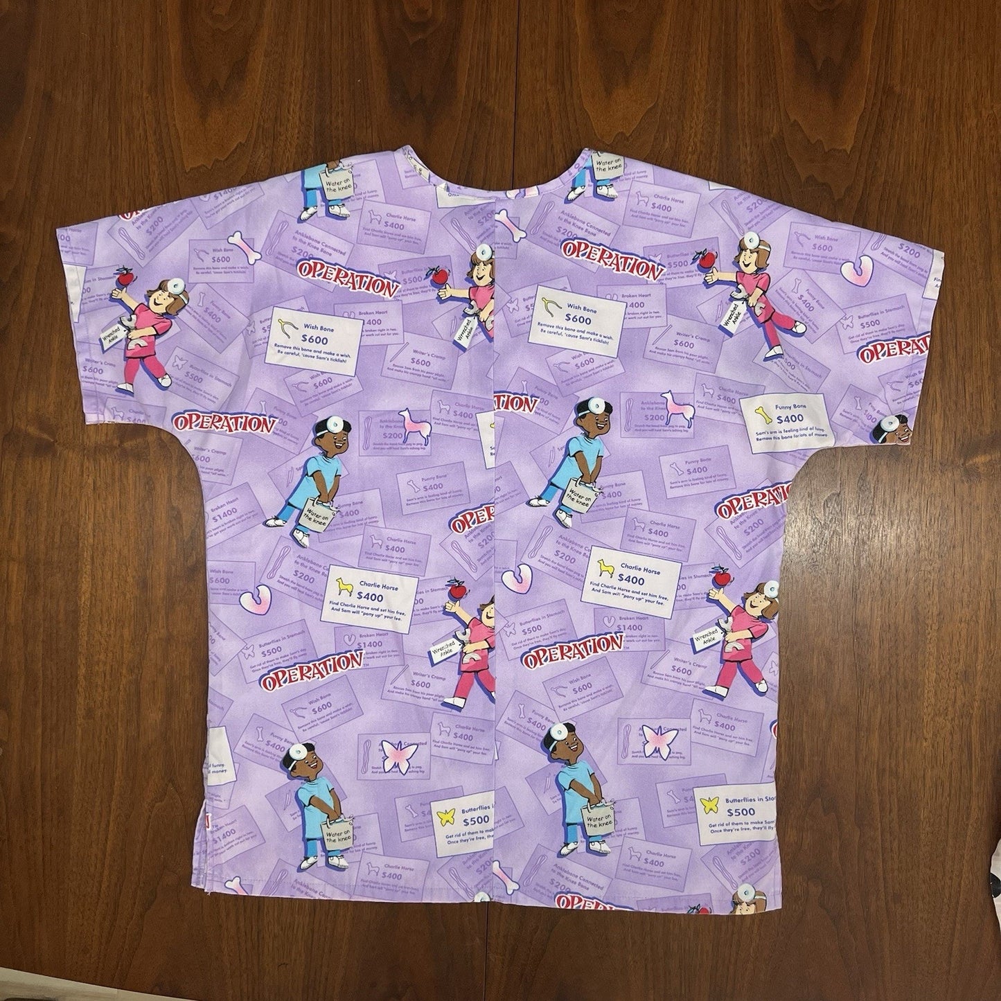 Rare Operation the Game Scrub Top XL Women’s AOP Purple