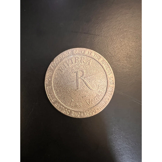 Vintage 1990 Riviera Hotel & Casino, LV One-dollar Slot Machine Token