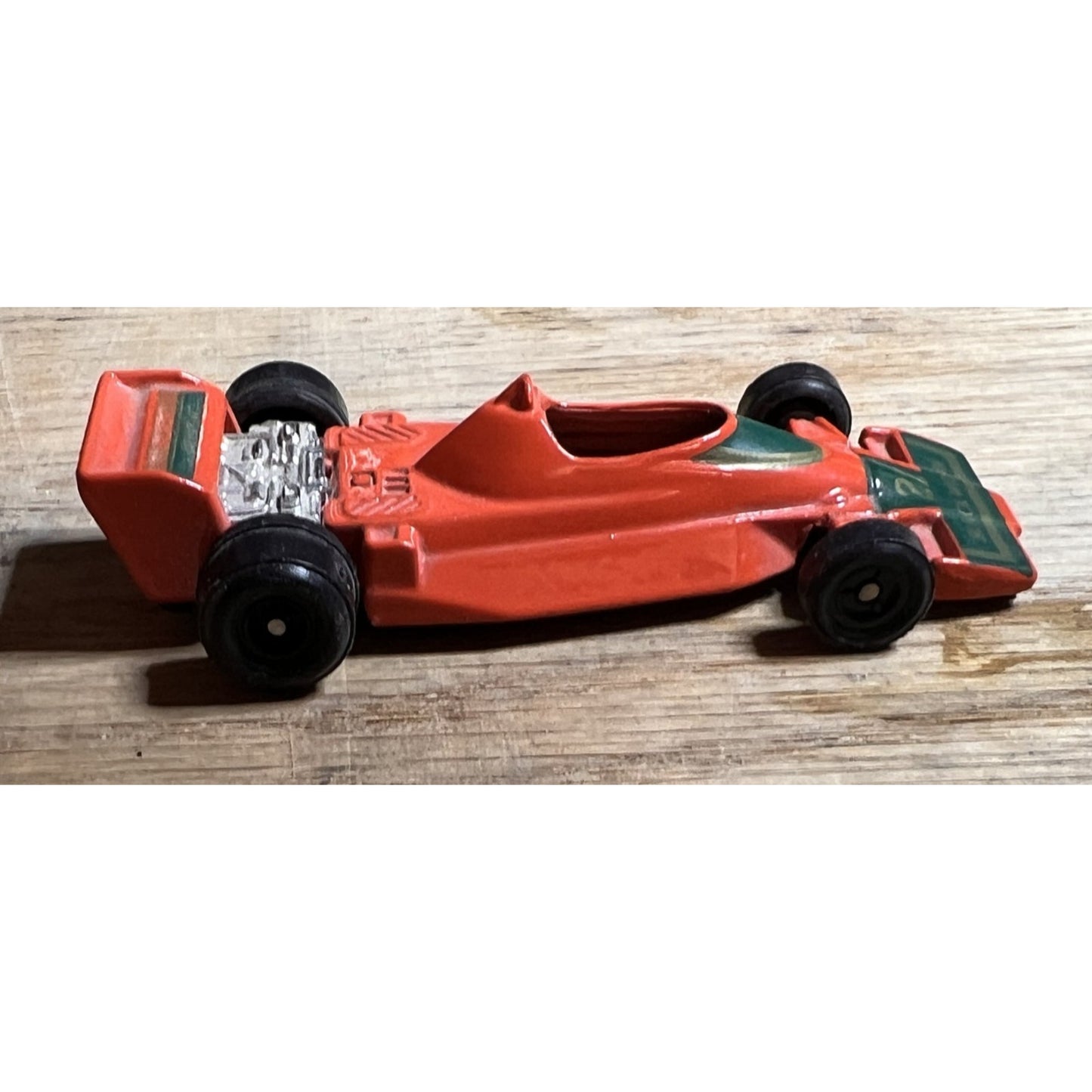 Vintage Orange Black Widow #22 F1 Diecast Car 1:64 Scale