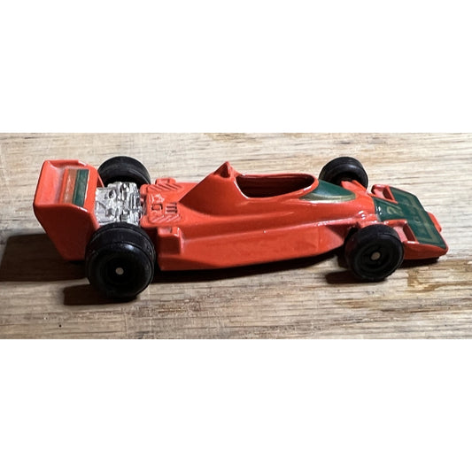Vintage Orange Black Widow #22 F1 Diecast Car 1:64 Scale