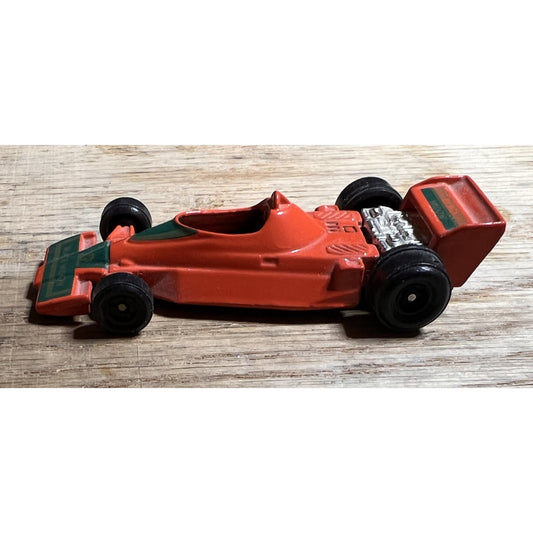 Vintage Orange Black Widow #22 F1 Diecast Car 1:64 Scale